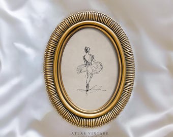 May include: An oval, gold-colored frame with a sketch of a ballerina. The frame has a ridged border and holds a drawing of a dancer in a tutu. The text "ATLAS VINTAGE" and "Curated Vintage Art" are at the bottom.