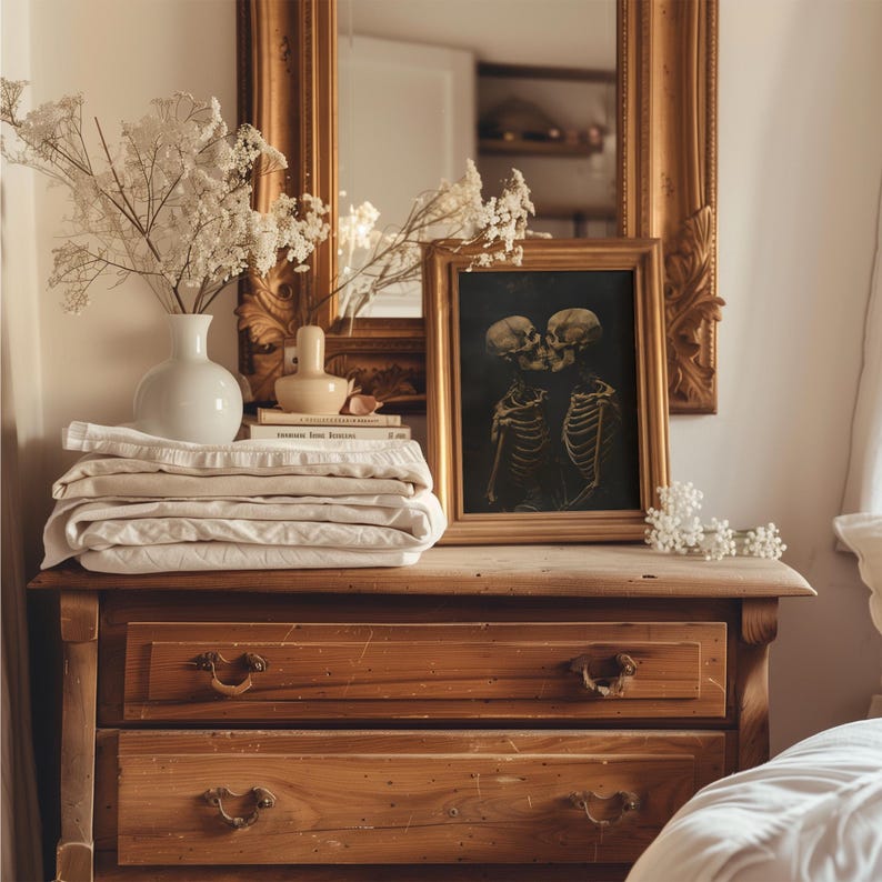 Spooky skeleton lovers embracing, framed by shadows.