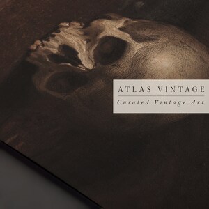 May include: A close-up of a vintage drawing of a human skull. The drawing is in shades of gray and brown. The text "ATLAS VINTAGE Curated Vintage Art" is visible in the lower right corner of the image.