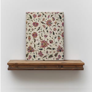 Mughal-inspired tapestry artwork featuring elegant floral designs.