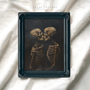 Gothic skeleton couple kissing in a dark, romantic scene.