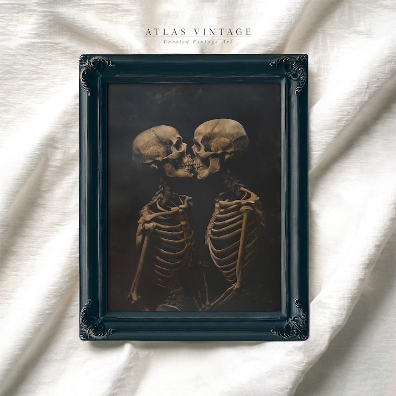 Gothic skeleton couple kissing in a dark, romantic scene.