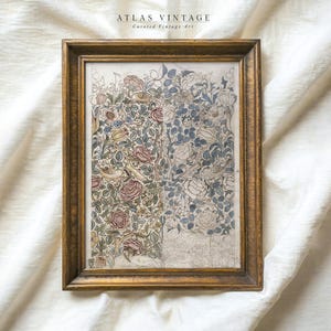 May include: A framed vintage print of a floral design with birds. The print is in black and white with a colored section on the left side. The colored section features pink, red, and yellow flowers with brown birds. The text "ATLAS VINTAGE Curated Vintage Art" is at the top of the print.