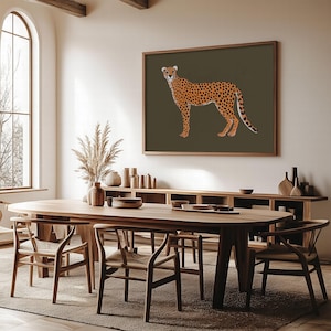 Close-up of cheetah silhouette with a soft jungle backdrop.