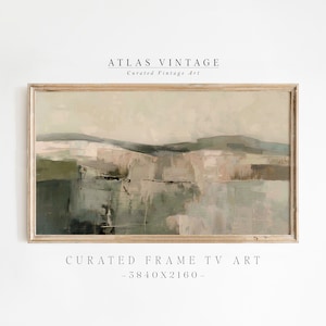 May include: A framed abstract landscape painting with muted tones of green, brown, and beige. The painting is in a light wood frame and has the text "CURATED FRAME TV ART - 3840X2160 -" below it.