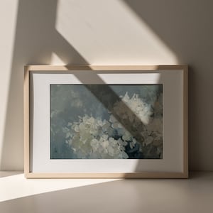 May include: A framed painting of white flowers in a blue and white abstract style.