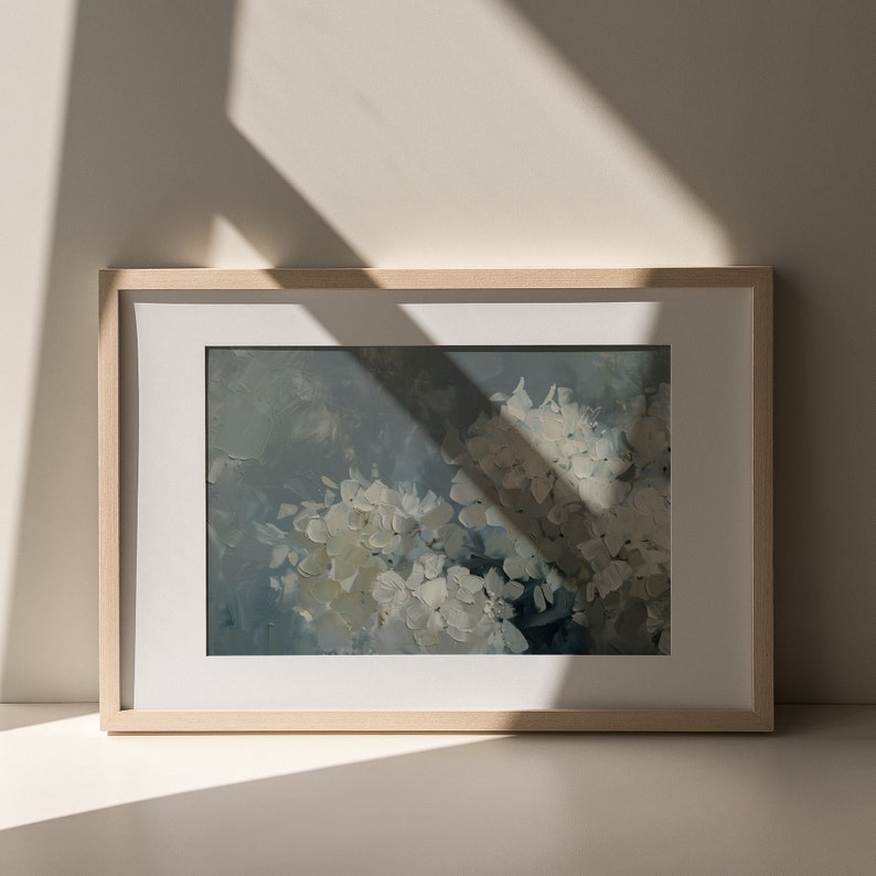 May include: A framed painting of white flowers in a blue and white abstract style.
