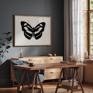 Moody wall art with insect design