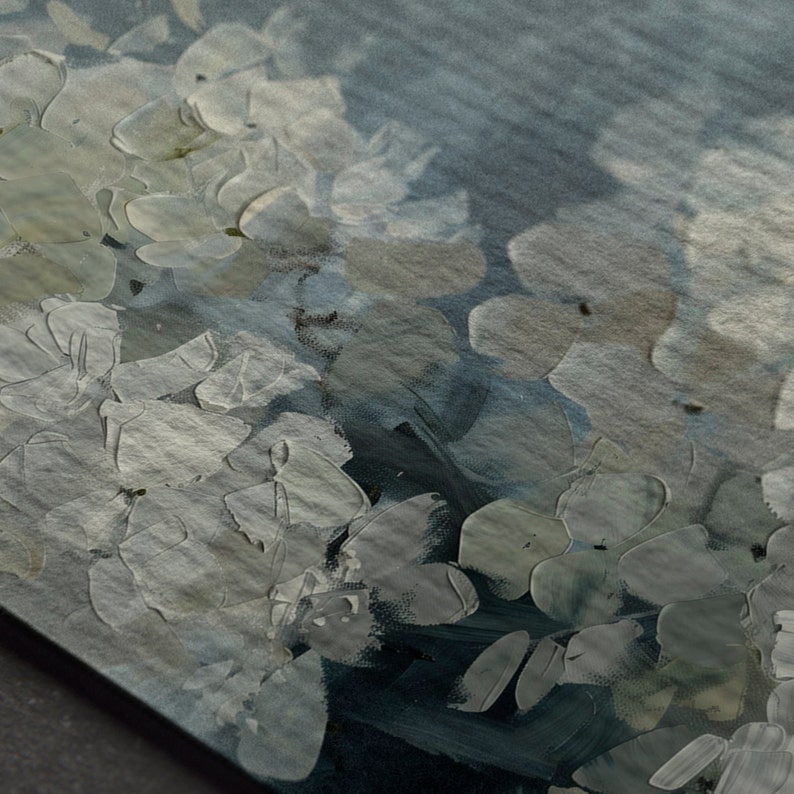 May include: Abstract painting with a textured, brushstroke effect. The painting features shades of gray, blue, and white, creating a sense of depth and movement. The brushstrokes are visible and add to the overall texture of the painting.