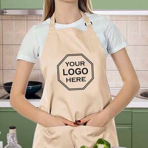 Delantales personalizados para mujeres u hombres, añade tu texto o nombre  bordado, delantal personalizado de longitud completa con bolsillos (1  pieza) : Hogar y Cocina 