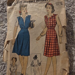 May include: Vintage sewing pattern by Du Barry Perfect Pattern. The pattern features illustrations of two dresses, one blue and one red plaid, with a size 16 and bust 34 measurement. The pattern is on aged paper with some wear and tear.
