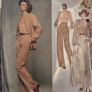 May include: Vintage Vogue Paris Original Christian Dior sewing pattern. The cover shows a woman in a tan suit and illustrations of other outfits. Text includes "Vogue Paris Original" and "Christian Dior".