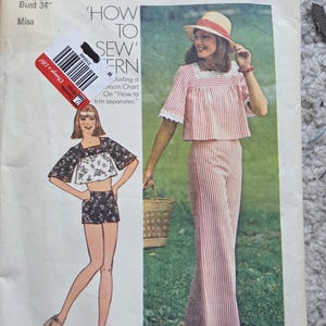 May include: Vintage Simplicity sewing pattern, size 12, featuring a two-piece outfit with a striped top and pants. The pattern includes instructions for young junior-teens. The image shows a woman wearing the outfit, with a bust measurement of 34 inches.