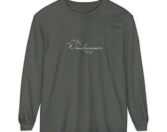 May include: A dark gray long-sleeve shirt with the cursive text "Windrunner" in white. The shirt has a crew neck and long sleeves. The text is centered on the chest.