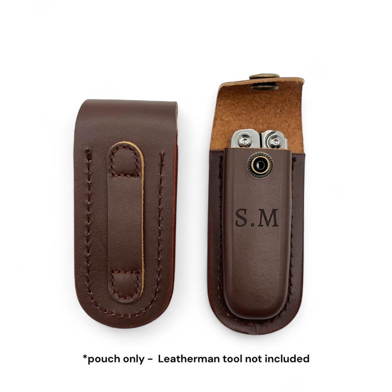 May include: Two brown leather pouches, one closed and one open, displaying a multi-tool. The open pouch reveals the tool and has the initials "S.M" engraved on it. The closed pouch has a belt loop. The text at the bottom reads "pouch only - Leatherman tool not included."