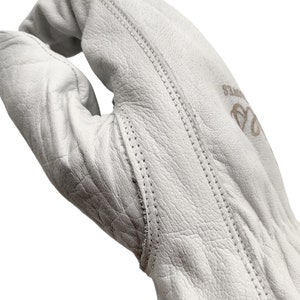 May include: White leather work gloves with reinforced stitching and the word "Gloves" embroidered on the back of the hand.