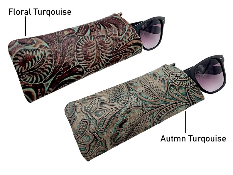 May include: Two turquoise leather sunglasses cases with an embossed floral pattern. The case on the left is labelled "Floral Turquoise" and the case on the right is labelled "Autumn Turquoise".