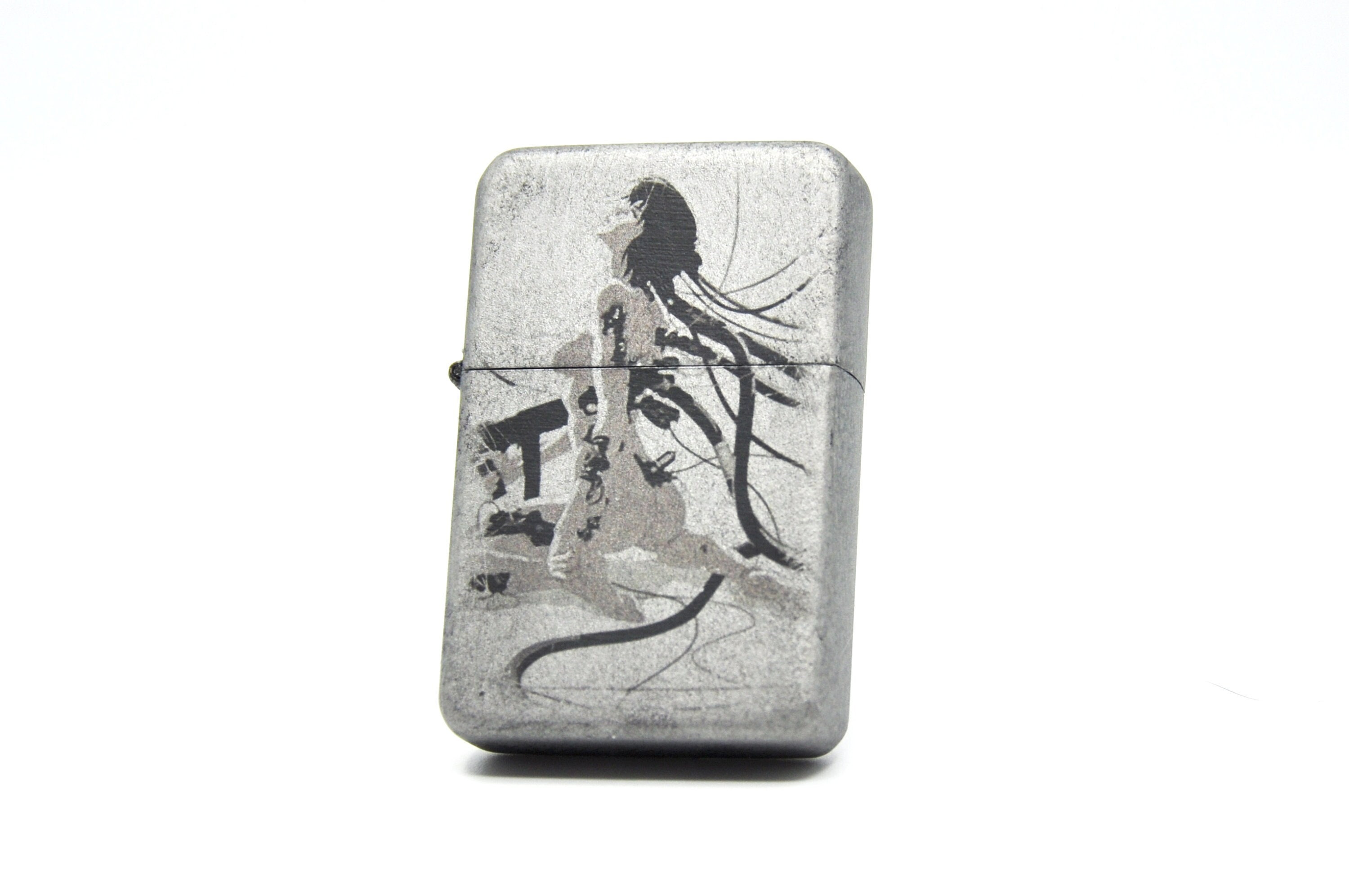 Flip Top Lighter in a Case With a Ghost in the Shell