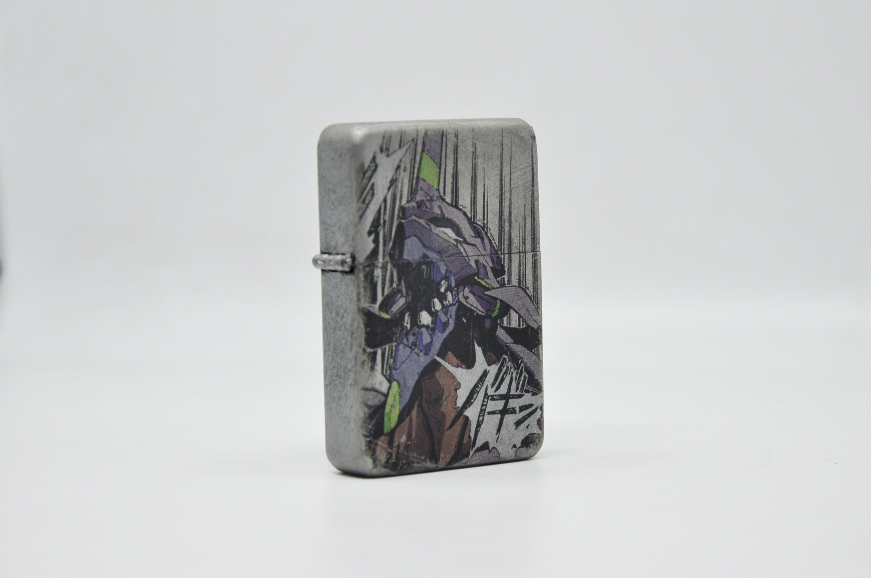 Flip Top Lighter in a Case With a Neon Genesis Evangelion Flip Top Lighter in a Case With a Neon Genesis Evangelion