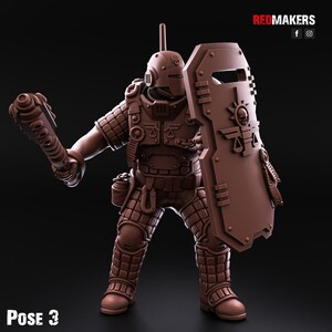 May include: A brown plastic miniature figure of a soldier wearing armour and holding a weapon and a shield. The soldier is wearing a helmet with a skull and crossbones symbol. The shield has a symbol of a scale of justice and a skull. The figure is posed in a dynamic action pose. The figure is labelled "Pose 3".