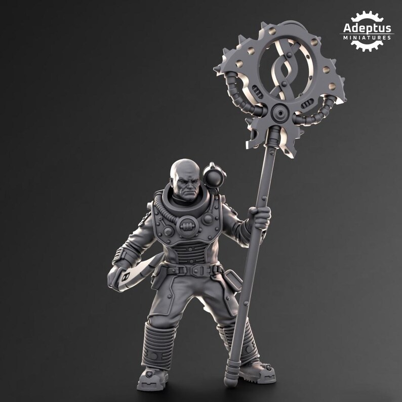 May include: A gray plastic miniature of a futuristic character holding a large, detailed, gear-shaped weapon. The character is wearing a helmet and a suit with a belt and pouches. The weapon has a long handle and a circular head with gears and pipes.
