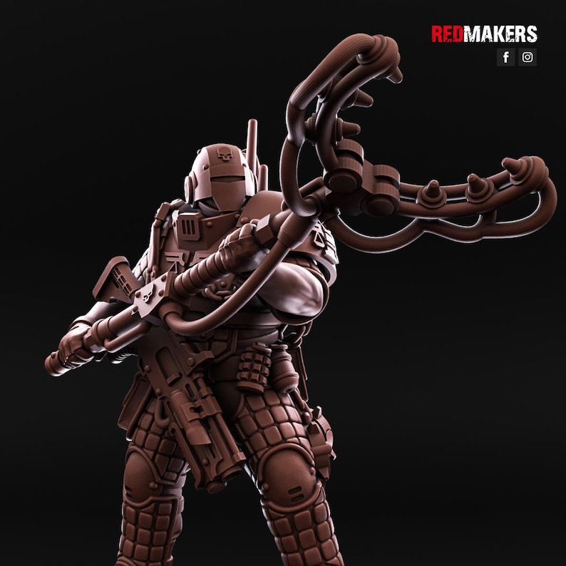 May include: A brown plastic miniature figure of a futuristic soldier holding a weapon with a long, curved barrel. The soldier is wearing a helmet and armour with a detailed design.
