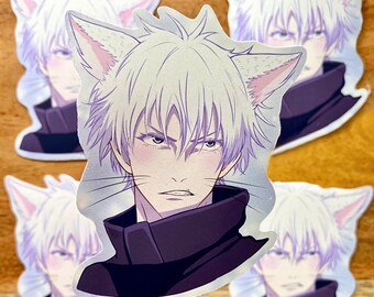 May include: A sticker featuring a white-haired anime character with cat ears. The character has a serious expression and is wearing a dark purple shirt.