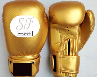 Guantes de boxeo de cuero dorado: equipo de fitness elegante y duradero para un entrenamiento glamoroso