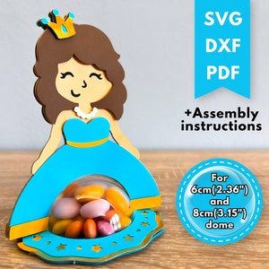 May include: A blue princess-themed party favor box with a clear dome for holding small treats. The box is designed to be assembled and includes assembly instructions. The box is for 6cm (2.36") and 8cm (3.15") domes.