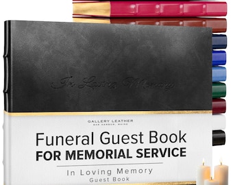 May include: A black guest book with the text In Loving Memory embossed on the cover, featuring a white band with the text Gallery Leather Bar Harbor Maine Funeral Guest Book For Memorial Service In Loving Memory Guest Book and gold accents.