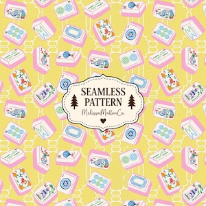 May include: A seamless pattern featuring various Mahjong tiles with colorful illustrations on a yellow background. A central white label with a scalloped edge displays the text SEAMLESS PATTERN and MelissaMattonCo. with two pine tree icons.