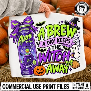 May include: A white graphic print featuring a purple Alani Nu energy drink can with a purple bow, a cauldron, a pumpkin, a ghost, and a witch hat. The text reads A BREW A DAY KEEPS THE WITCH AWAY. The design includes bats and a spider web.