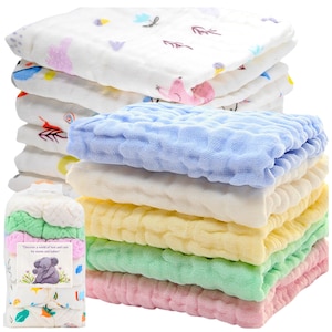 May include: A stack of 10 soft, multi-colored baby washcloths. The washcloths are made of a textured, gauze-like fabric. The top washcloth has a light blue color and a textured pattern. The washcloths are stacked in a rainbow pattern, with the colors pink, green, yellow, white, and light blue. The washcloths are packaged in a clear plastic bag with a label that reads "Discover a world of love and care for moms and babies".