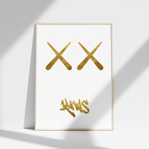 May include: Gold framed print featuring two gold X's and the word "HWS" in gold script.