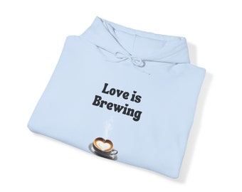 Love is Brewing Hoodie | A Cozy Embrace of Love | Cotton Unisex Hooded Sweatshirt | Cozy Winter Fashion, Unique Gifts, Thoughtful Present