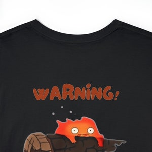 Adorable Howl&#39;s Moving Castle T-Shirt Gift - Featuring the Charming Calcifer!