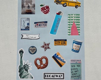 May include: A sticker sheet featuring various New York City themed stickers. Includes a yellow taxi, Statue of Liberty, a pretzel, and the text "Broadway". Other stickers say "New York" and "City Girl".
