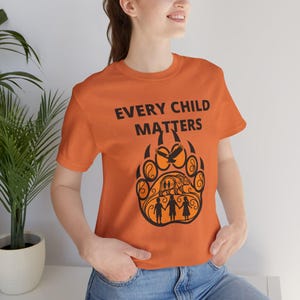 Every Child Matters T-Shirt | Indigenous Paw Print Design