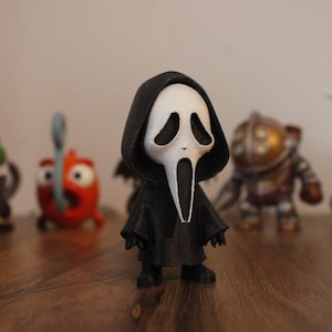 Spooky Masked Killer Chibi Figurine - Hand Painted 3D Printed Horror Statue - Slasher Movie Collectible - Halloween Shelf Decor Gift