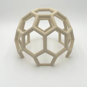 snake climbing dome in beige color