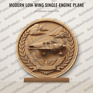 May include: A circular wooden plaque featuring a carved low-wing single-engine plane, clouds, and a laurel wreath with a central eagle emblem. The text reads MODERN LOW-WING SINGLE-ENGINE PLANE and 3D Illusion Laser File.