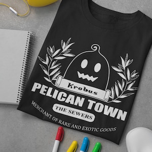 T-shirt STARDEW Krobus Merchant, shirt Stardew Valley Pelican Town, T-shirt Merchant of Rare Goods
