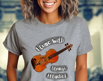 May include: A gray t-shirt with a graphic of a violin and the text "I come with strings attached".