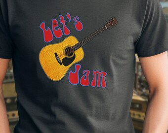 May include: A dark gray t-shirt with a graphic of a brown acoustic guitar and the text "Let's Jam" in red and blue lettering.