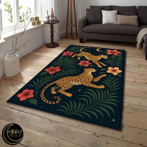 May include: A rectangular area rug with a dark blue background featuring two leopards with yellow spots, surrounded by red and orange flowers and green foliage. A crescent moon and stars are also depicted. The rug is placed on a wooden floor.