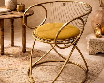 Sculpturale messing stoel