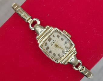 Elgin DeLuxe Damenarmbanduhr 17 Jewels 10K Gold Fill mit JB Champion Armband Funktioniert nicht