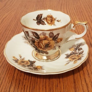 Vintage Fine Bone China Tea Cup and Saucer with Golden Yellow Roses, Brown leaves and Gold Trim