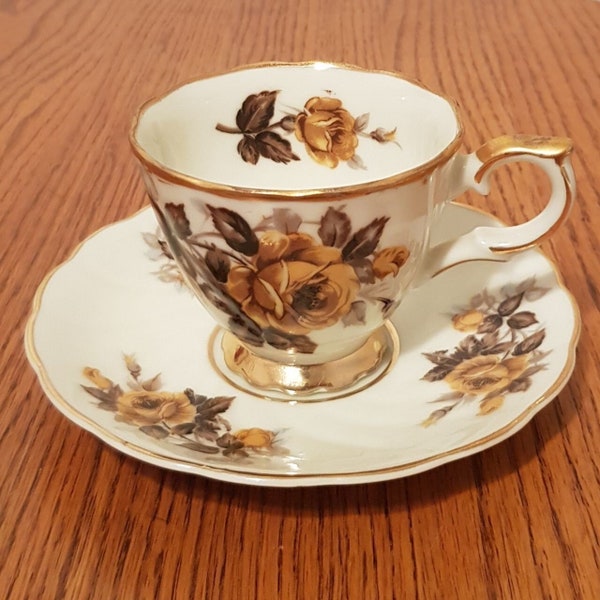 Vintage Fine Bone China Tea Cup and Saucer with Golden Yellow Roses, Brown leaves and Gold Trim