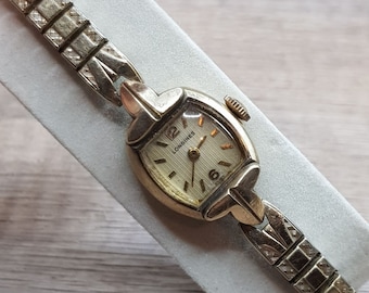 Longines schweiziskt damarmbandsur med 17 juveler, 10 karat guldfyllt, 1952, fungerande
